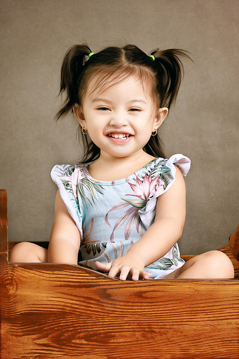 3 year old baby girl smiling