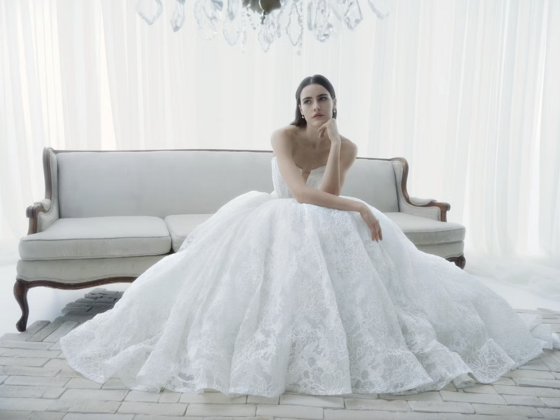 What is a couture wedding dress? Find out below: couture craftsmanship, pricing, wedding dress ordering timeline, & wedding dress designers. 