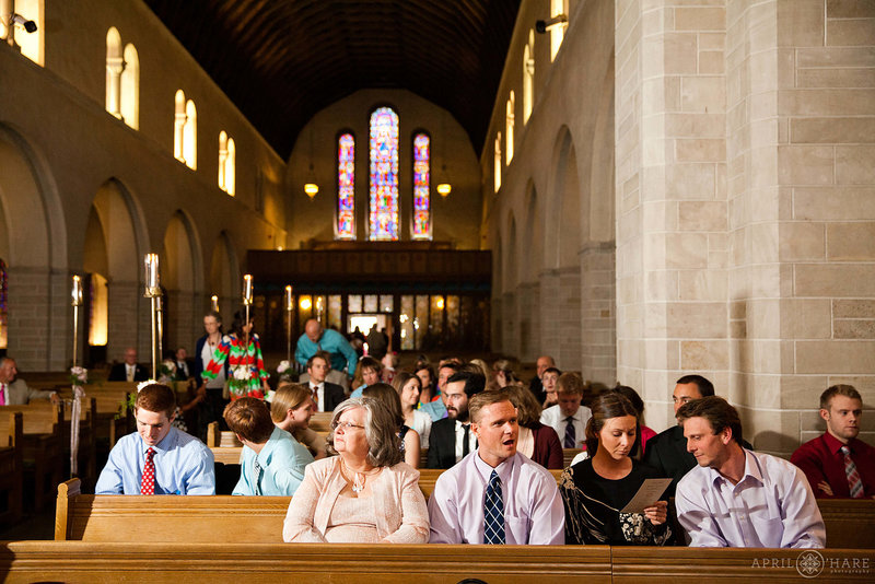 Wedding-Guests-Seated-in-Pews-in-Historic-Colorado-Springs-Shove-Memorial-Chapel