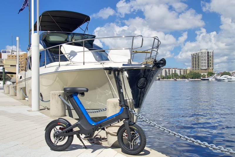 Blue Go-Bike M3 with Yacht in the background; V&D Electric Bikes