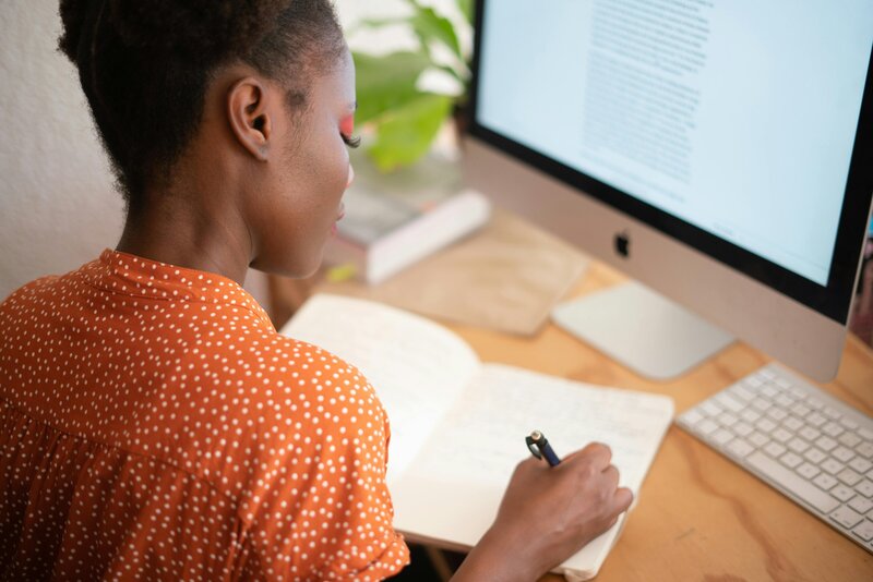 Student sitting at her computer working