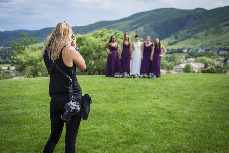 Colorado wedding photographer, Casey Van Horn, photographs a group of a bride and bridesmaids.