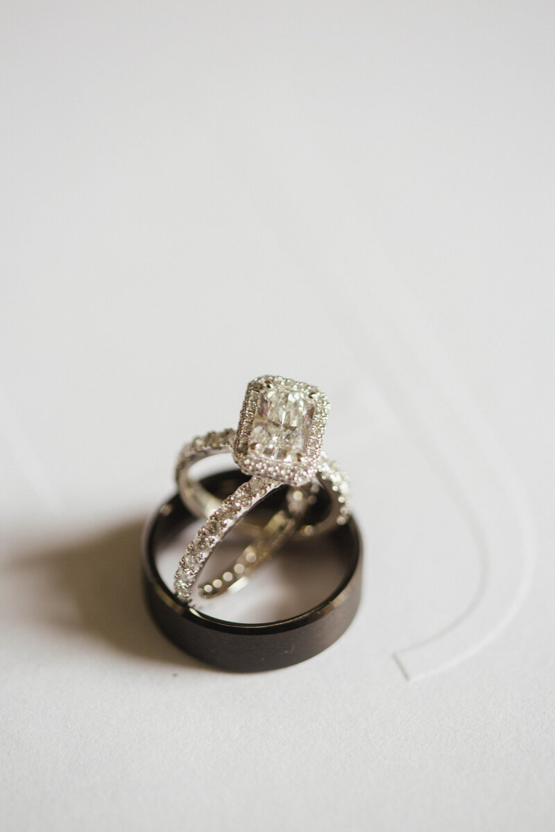 Emerald Cut diamond wedding ring and groom wedding band photo