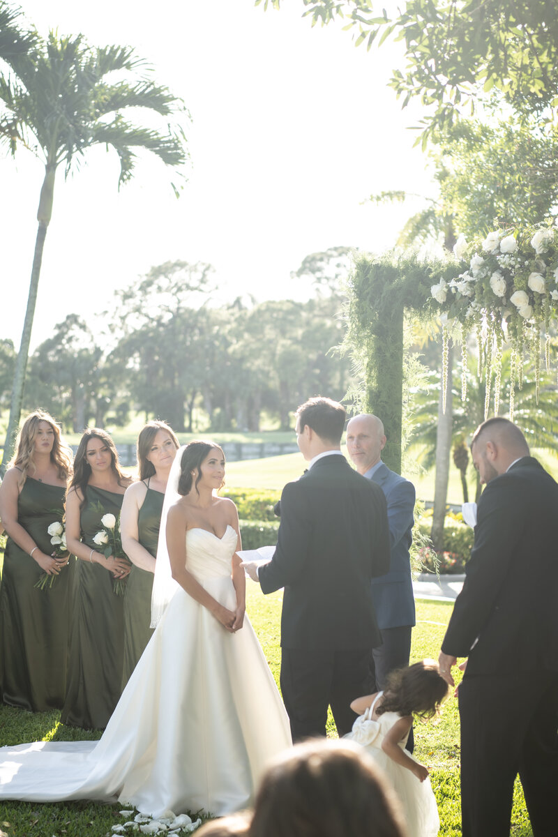 Bride and groom reading vows at Naples Florida wedding