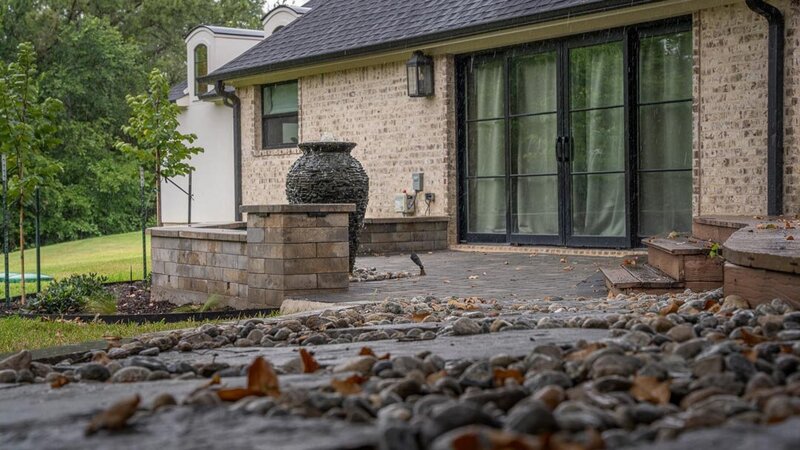 Pearson project showcasing a beautifully designed backyard patio with custom landscaping in Dallas, TX. Ideal for outdoor relaxation and entertaining.
