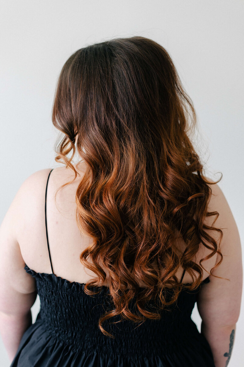 Bold curls and volume with the Ft. Worth blowout style, a Texas favorite at SoCo