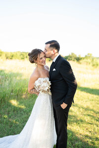 fallback shared on Invalid Date | Groom kissing bride at vow renewal in Georgia