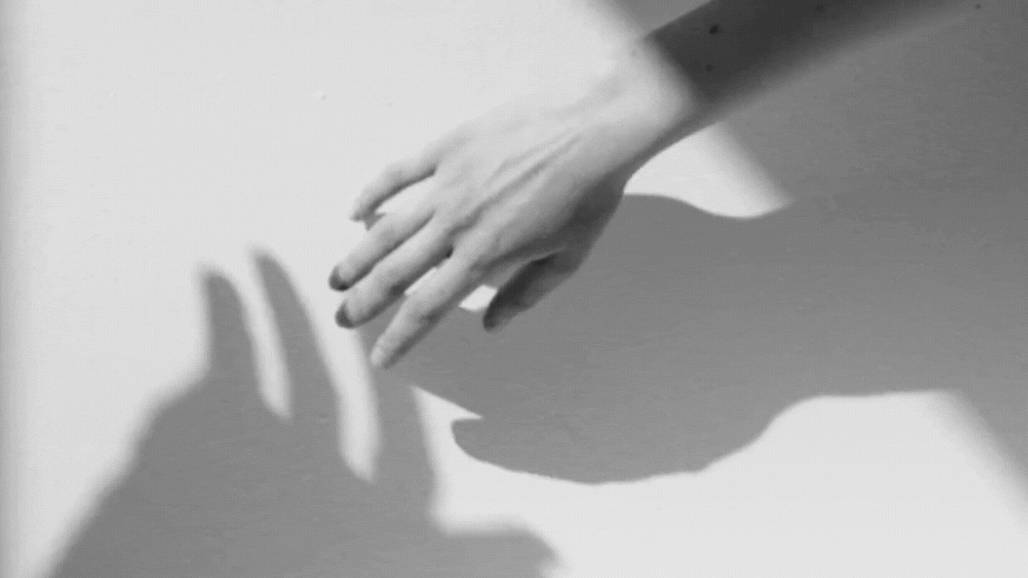 stylish moving image of hand and shadow
