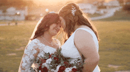 Gif of lesbian brides during golden hour