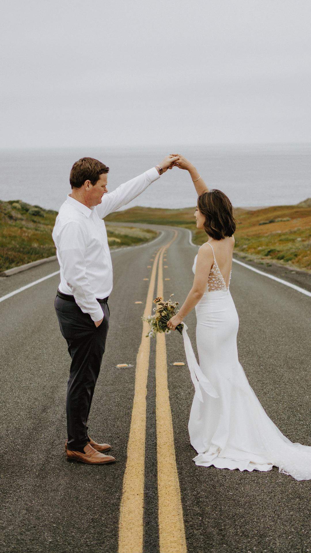 bride and groom dancing in street for Point Reyes elopement