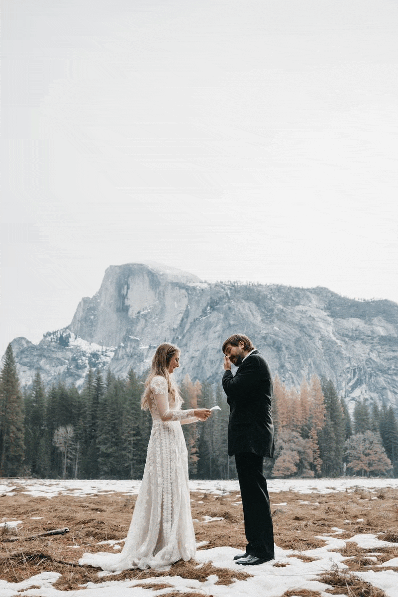 couple embracing by mountains
