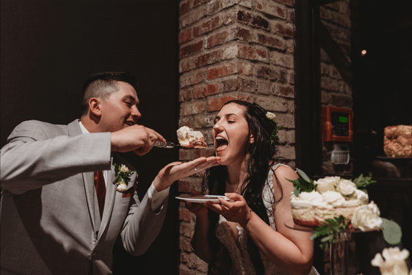 Couple sharing cake at Olympia WA Wedding