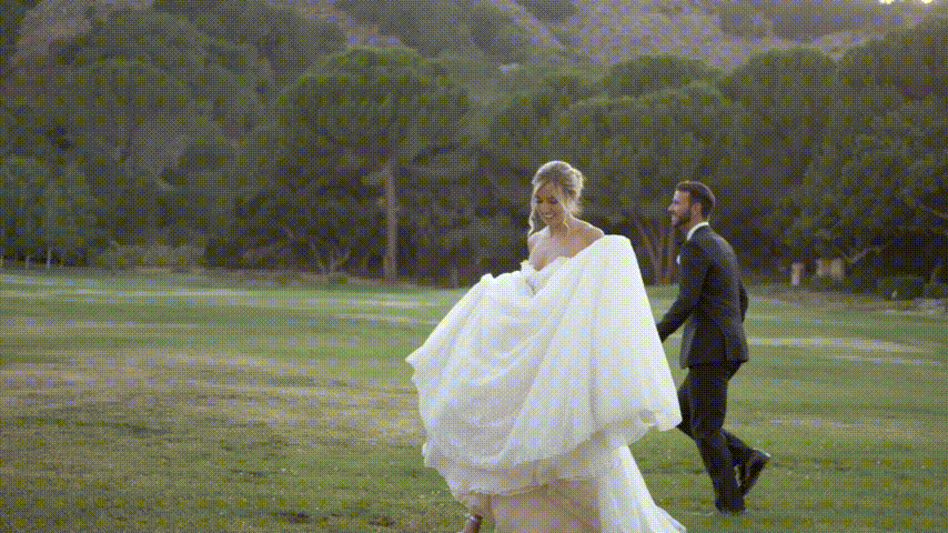 Gif of couple running together on wedding day