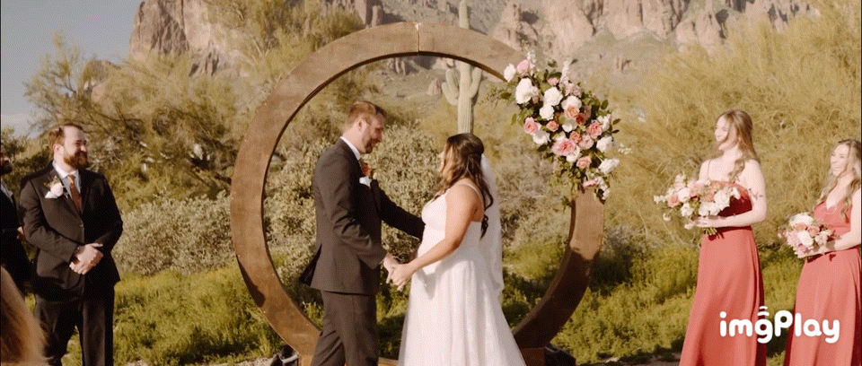 couple's first kiss during their desert elopement ceremony