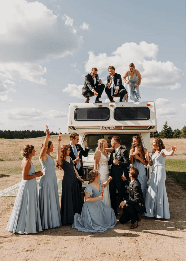 bridal party dancing by camper