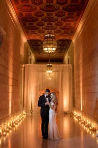 Couple dancing in a candlelit corridor, photographed by Texas wedding photographer Vanessa Joy
