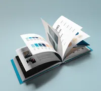 Lighthouse Leadership brand guide open to blue and orange identity spreads