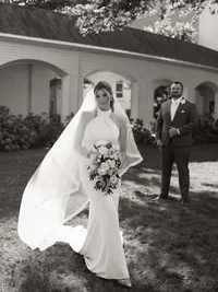 Chatham Bars Inn Cape Cod Wedding Bride Portrait with groom standing behind her admiringly.
