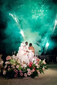 Wedding toasts with fireworks at Villa Lario Resort Mandello Lake Como Italy destination wedding
