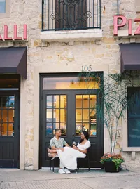 Engagement session at Adriatica Village McKinney Texas — cobblestone streets Mediterranean style