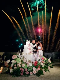 Wedding toasts with fireworks at Villa Lario Resort Mandello Lake Como Italy destination wedding