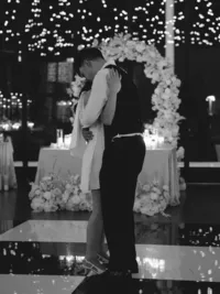 Bride and groom hug during dance at Hall of Lights Dallas Texas wedding — Stephanie Michelle Photography