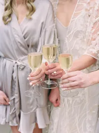 Bride getting ready at Hotel Vin Grapevine Texas — Tease to Please Hair and Makeup