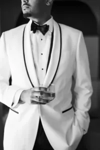 Groom portraits at The Thompson Hotel Dallas — black tie wedding photography