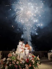 Wedding toasts with fireworks at Villa Lario Resort Mandello Lake Como Italy destination wedding