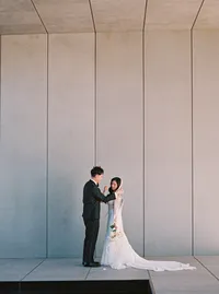 Bride and groom first look at Hall of Lights Carrollton Texas wedding
