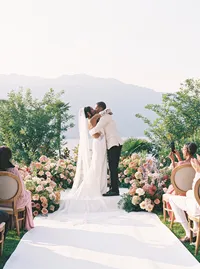 First kiss at Villa Lario Resort Lake Como Italy wedding ceremony