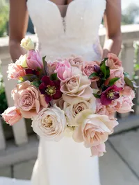 Bridal bouquet portrait on terrace at Villa Lario Resort Mandello Lake Como Italy — fine art destination wedding photography