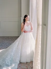 Bride in wedding dress at Hotel Vin Grapevine Texas — classic Texas wedding photography