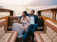 Bride and groom boating on Lake Como Italy — destination wedding weekend