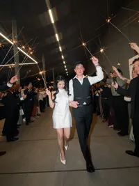 Bride and groom exit at Hall of Lights Dallas Texas wedding
