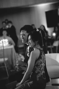 Bride & groom smiling in traditional Chinese attire at Hall of Lights Dallas - Stephanie Michelle Photography