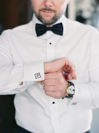 Groom getting ready in penthouse suite at The Joule Hotel Dallas