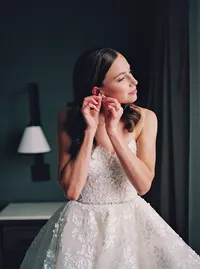 Bride getting ready at Hotel Vin Grapevine Texas — Tease to Please Hair and Makeup