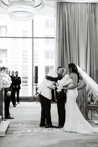 Bride walking down the aisle at The Thompson Hotel Dallas wedding ceremony