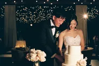 Couple during Cake cutting at Hall of Lights Dallas - Stephanie Michelle Photography