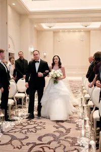 Bride Walking down the aisle at Hotel Vin Grapevine Texas — classic Texas wedding photography