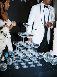 Champagne tower at The Thompson Hotel Dallas wedding reception