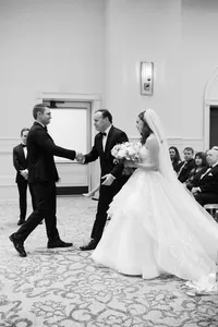 Bride Walking down the aisle at Hotel Vin Grapevine Texas — classic Texas wedding photography