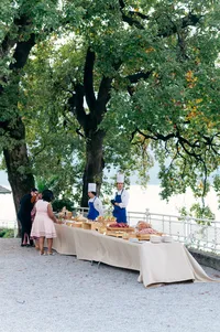 Hand-carved prosciutto at aperitivo hour Villa Lario Resort Lake Como Italy wedding