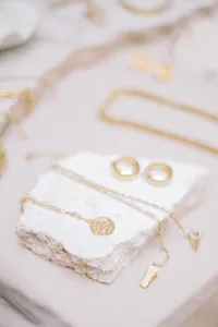 Gold jewelry on display for Echo Vintage Goods at Honolulus Art and Flea