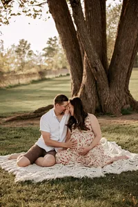 Candid moments from a sunset maternity photoshoot in Peterborough park