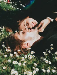 Couple Lying on Grass
