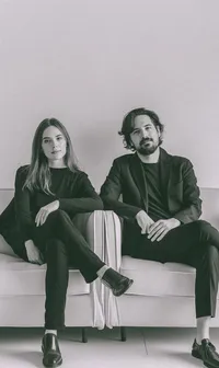 Composed Couple on Sofa