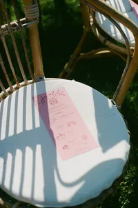 Custom cards sitting on a wedding ceremony seat in Europe