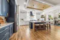 2 toned kitchen with vaulted ceilings